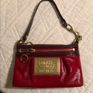 Coach red and gold purse